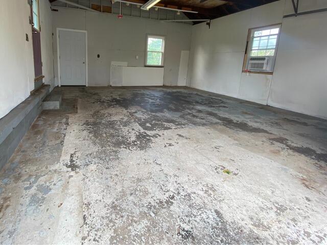 Dirty, stain concrete garage flooring