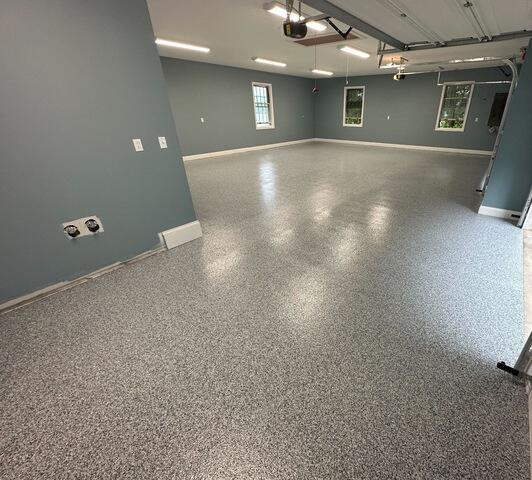 Large garage with new concrete floor coating