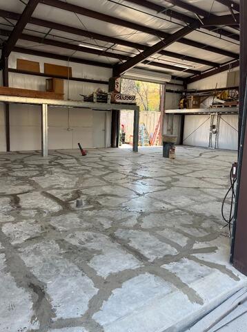 Stained, cracked concrete floor