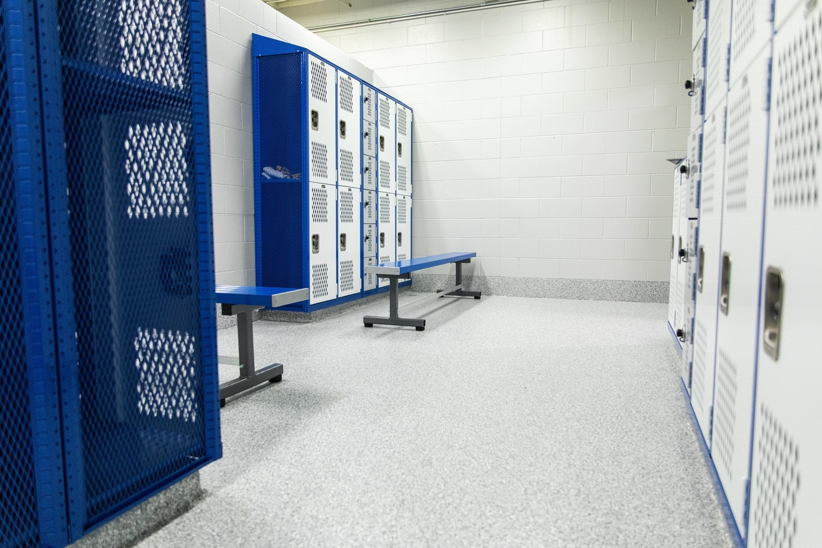 Locker room with gray flooring