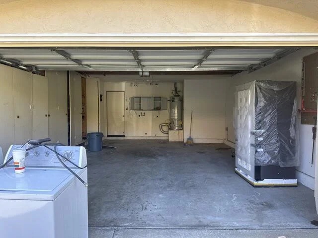 Garage with bare concrete and no storage