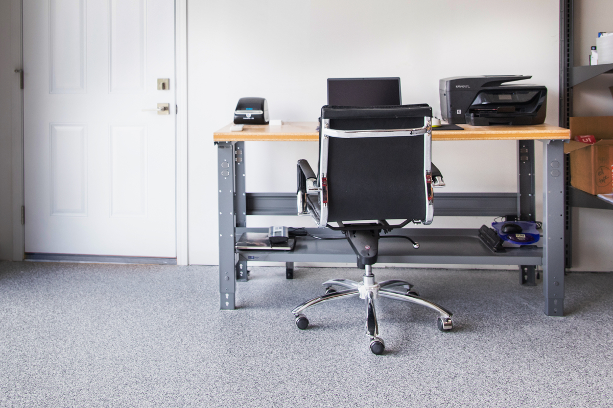 Home office with gray flooring