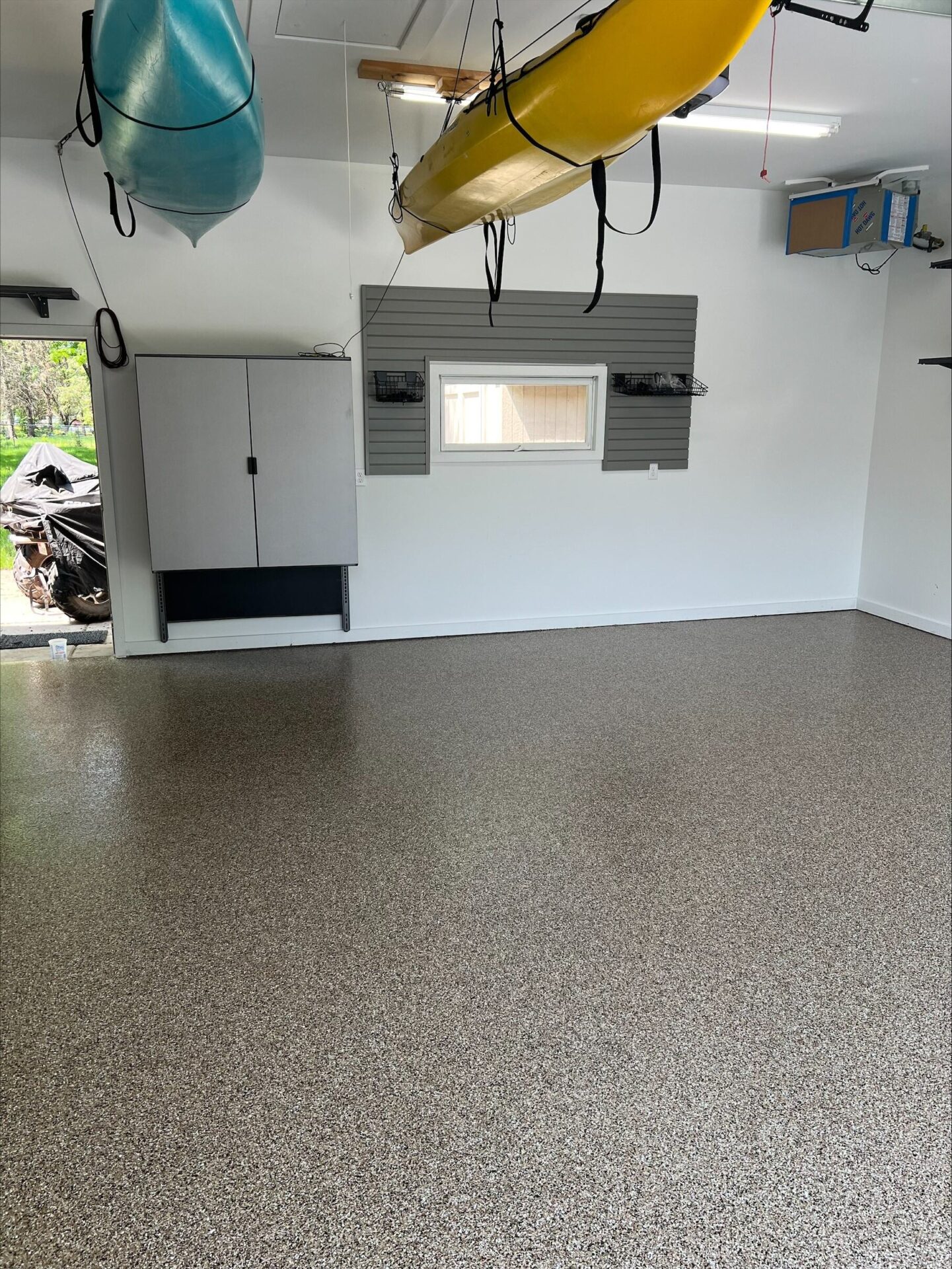 Polyaspartic floor coating and cabinet