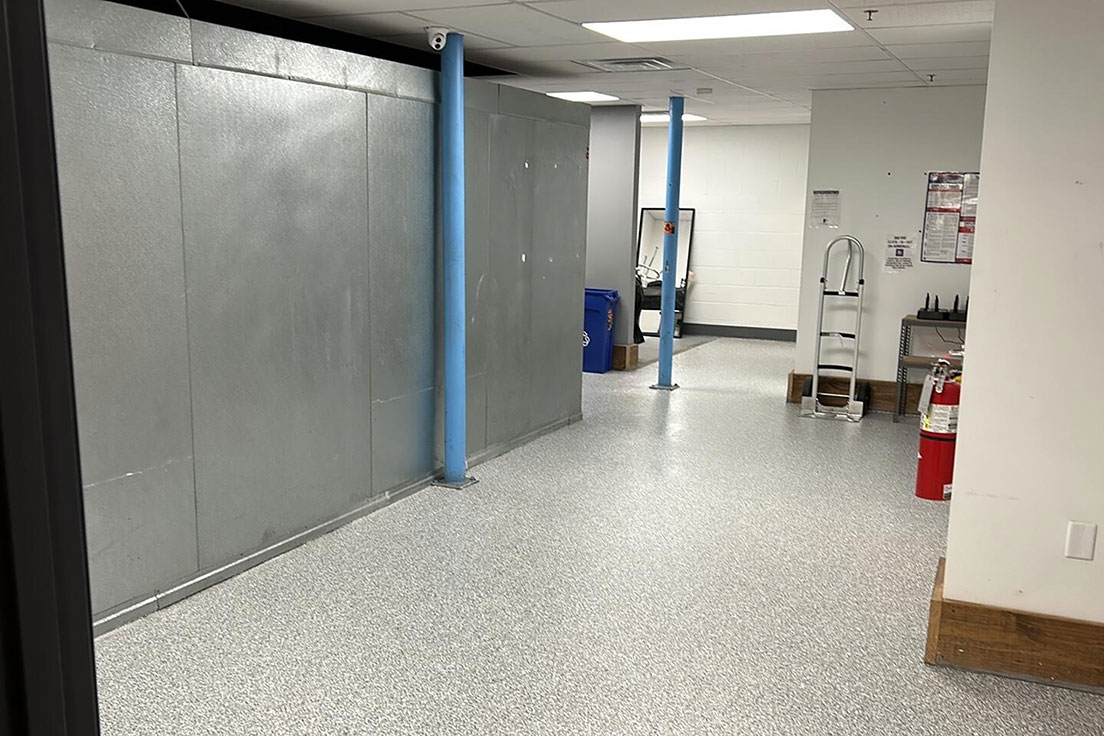 new commercial flooring after being installed | Hello Garage