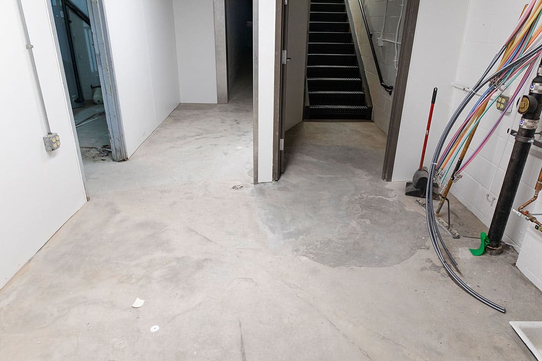 old commercial flooring before new floor coating being installed | Hello Garage