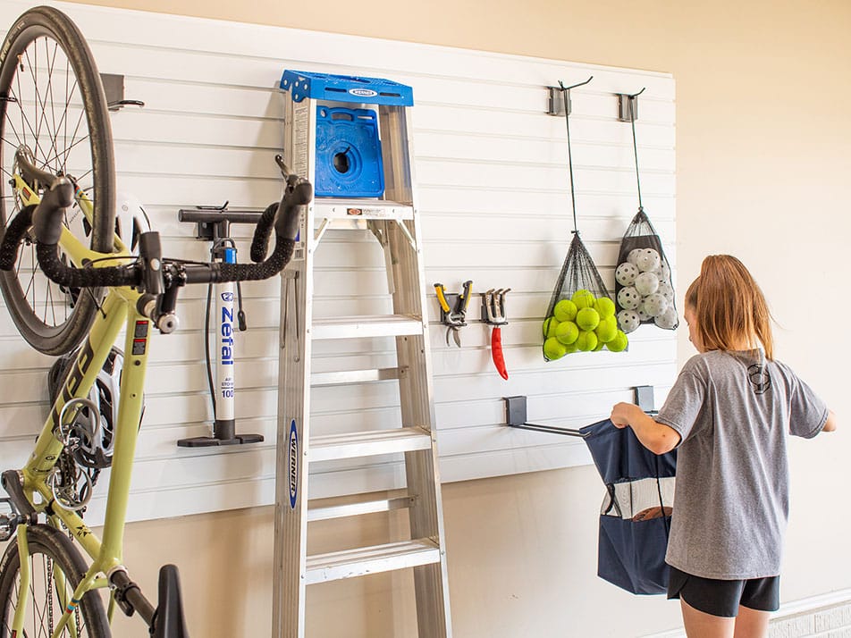 Items hanging from garage wall storage